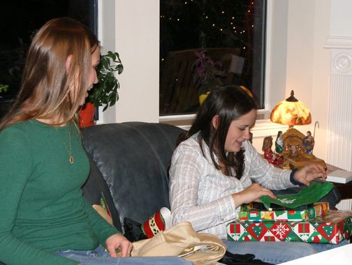 Mary opening gifts