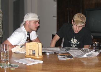 We're in the dark here.  We lost power for a few hours from the storm.  Patrick and John decide to check the movie listings