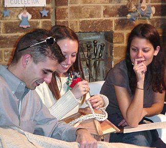 Shaun and Kelly opening gifts