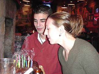 Shaun and Kelly blowing out the candles