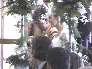 Debi Mattingly walking her daughter Kelly up the aisle