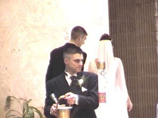 Patrick getting the Holy Water
