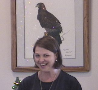 Now Joanie's got the bird on her head!