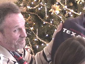 Mike Stryk showing off his new Texans sweat shirt