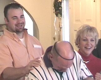 Wade and Eve are getting a big laugh watching Mike as Pat sorts though the Survival Box